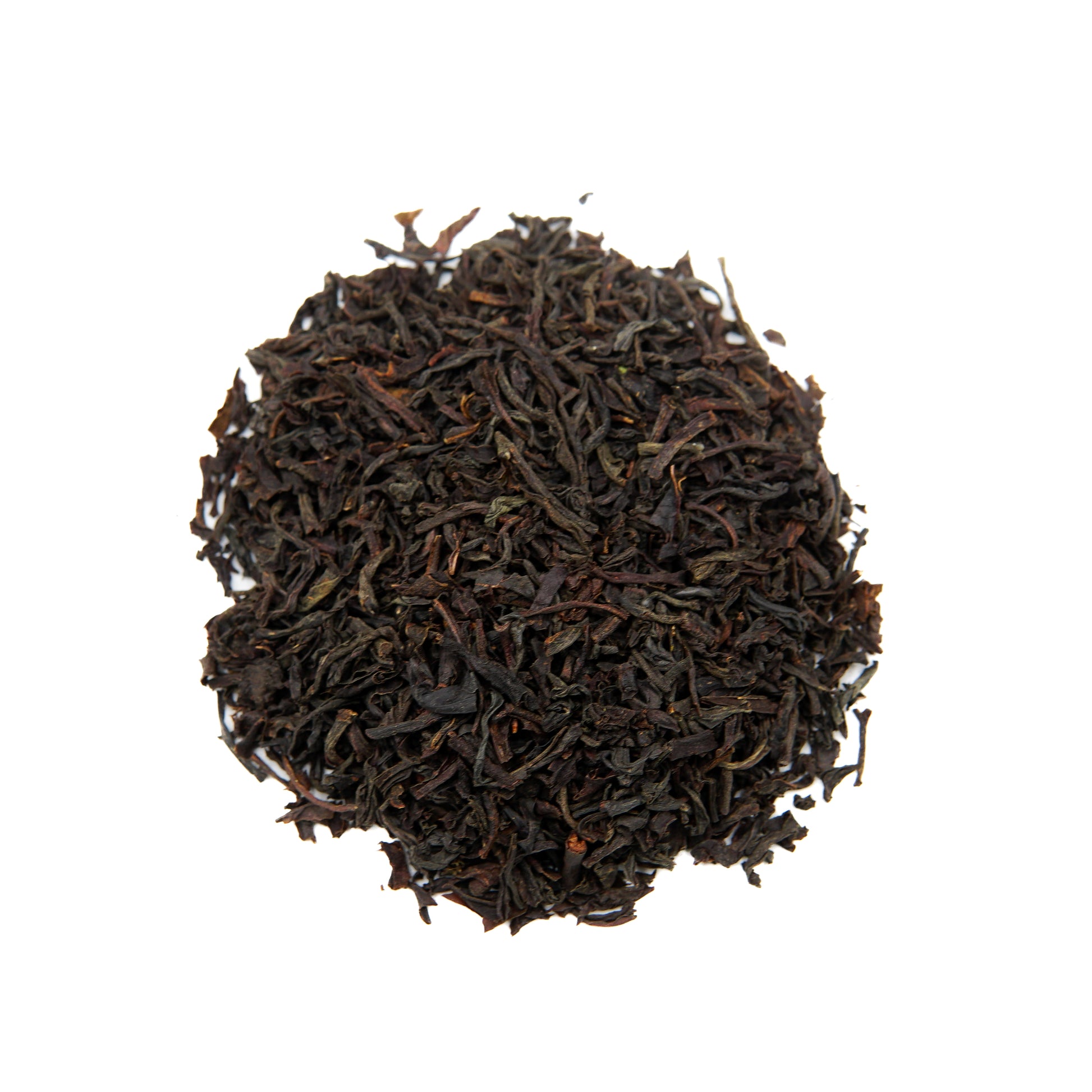 A mound of Piper and Leaf Tea Co. English Breakfast 40 Serving Loose Leaf tea is displayed on a white background.